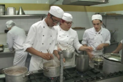 An image of ITS students working in the kitchen